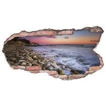 Vinilo agujero 3d atardecer en la costa