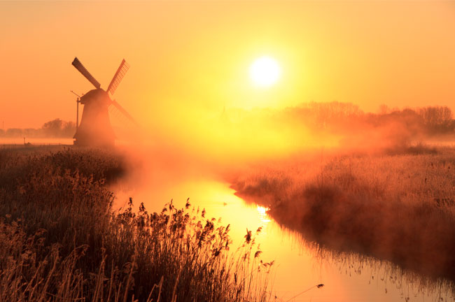 Fotomural o papel pintado atardecer molino holanda