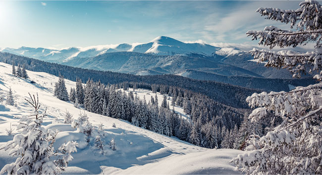 Fotomural o papel pintado montañas nevadas al atardecer