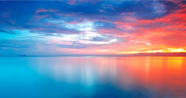 Fotomural atardecer en el mar colorido