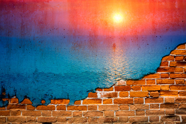 Fotomural pared rota con atardecer en el mar
