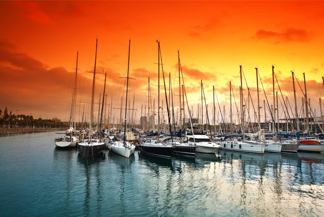 Fotomural barcelona puerto al atardecer