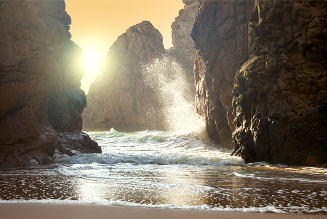 Fotomural atardecer rocas en la playa