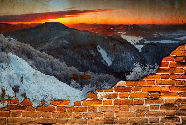 Fotomural efecto pared rota amanecer en las montañas