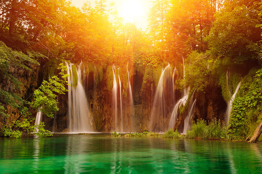 Fotomural Cascada con atardecer